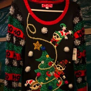 Festive Christmas Sweater with Elf and Tree Design
Red / Green black!